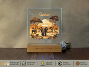 a picture of an elephant and a giraffe on a table