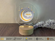 a glass plaque with a crescent and stars on it