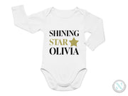a white bodysuit with the words shining star ollivia on it