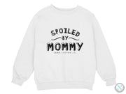 a white sweatshirt that says spoiled by mommy and loving it