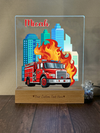 a glass block with a fire truck on it