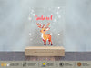 a glass block with a reindeer on it