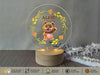 a clear acrylic with a picture of a teddy bear on it