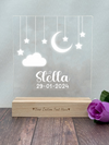 a clear acrylic sign with a purple rose