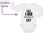 a baby bodysuit with the name 1 - der woman lily on it