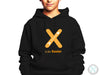 a young boy wearing a black hoodie with the letter x on it