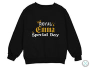 a black sweatshirt with the royal crown on it