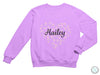 a purple sweatshirt with the word hailey printed on it