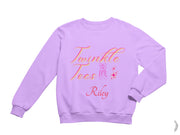 a purple sweatshirt with the words twinkle tees on it